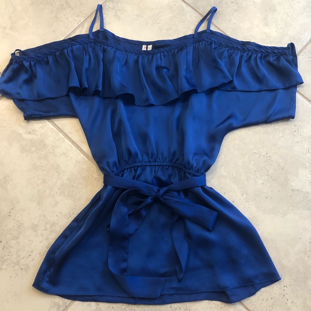 Dressy top with revealing shoulders and arms